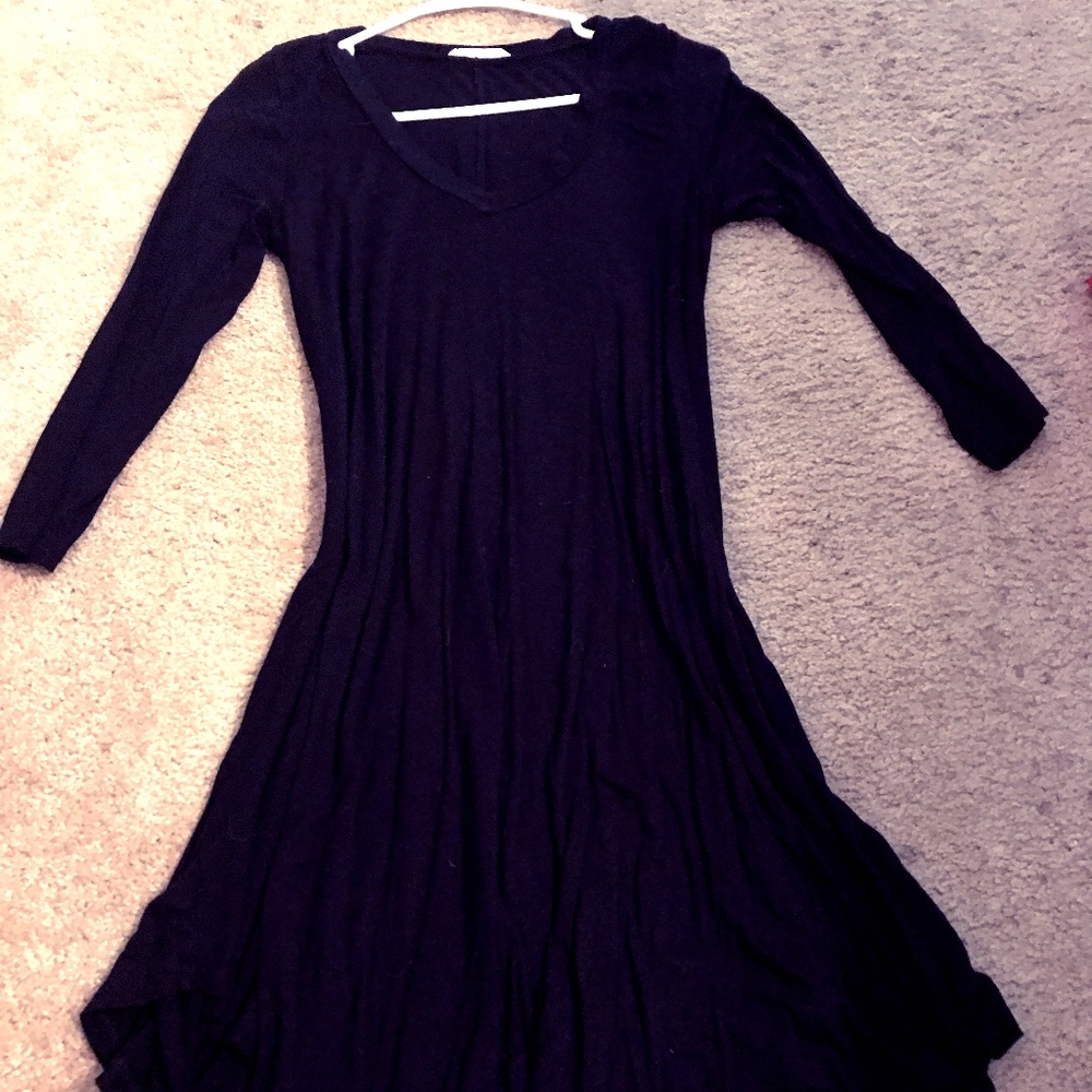 black dress with "V" shaped bottom